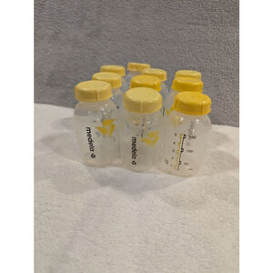 10 Baby Medela Clear and Yellow Breast Milk Storage Bottles